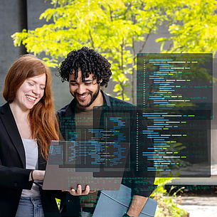 Students with a notebook, software code in the foreground