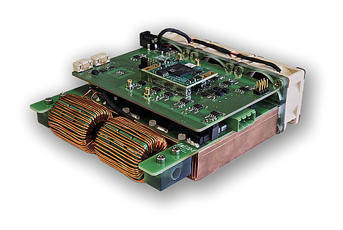 An electronic assembly consisting of several printed circuit boards with integrated circuits, microcontrollers and connections.