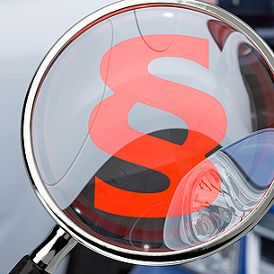 Paragraph icon on a magnifying glass. Photo source: bluedesign - Fotolia.com