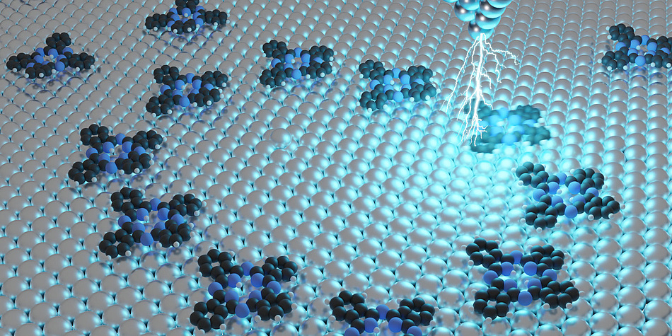 Ten molecules are arranged like a ring on a surface; a pointed structure is visible at the upper edge of the image, from which lightning flashes emanate.