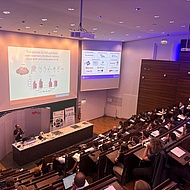 Brain Computer Interface Conference in Graz, September 2024. Many conference participants are sitting in the lecture hall to listen to Dr. Nick Ramsay.