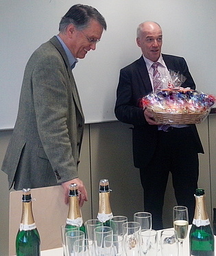 Prof. Heitmeir presents Prof. Pirker the institute's birthday present!