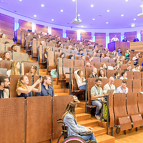 conference participants in the lecture hall