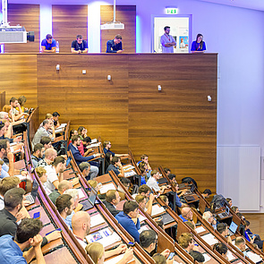 conference participants in the lecture hall